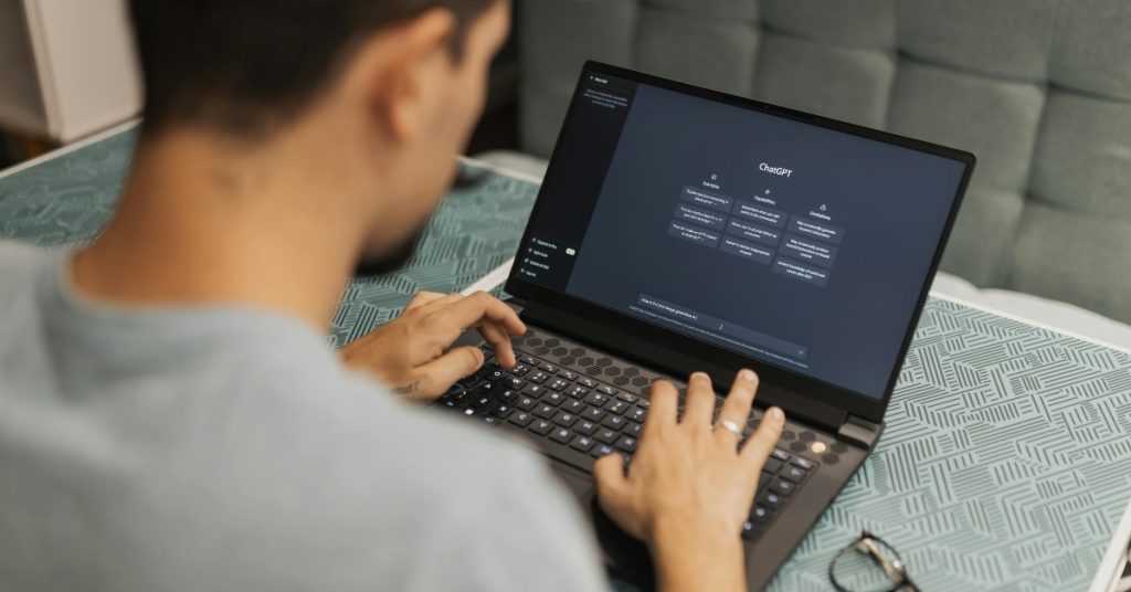 Man using chat gpt on his computer 